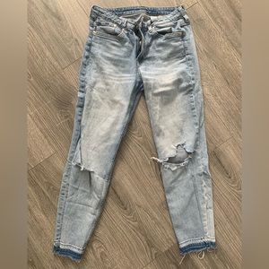 H&M skinny ankle jeans with raw cuff and distressed knees.